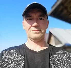 Николай